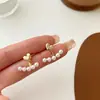 Pendientes de Perla en Forma de Corazón de Aguja Plateada de Dos Usos Estilo Coreano Pendientes de Temperamento Suave y Único Pendientes de Moda de Gama Alta
