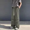Pantalones de invierno para hombre para exteriores, diseño de nicho de la alta calle americana, pantalones de senderismo impermeables, engrosados, con cremallera, ligeramente acampanados
