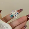 Diseño de Nicho Metalizado Mate Dorado Corazón Hueco Dulce Fresco Anillo Floral Vintage Microincrustado Circonita de Colores Anillo Apilable para Mujeres