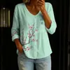 Nueva camisa estampada de cuello V abotonada de manga larga transfronteriza para mujer, elegante y con estilo para ir al trabajo, top casual único y moderno