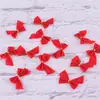 Adornos decorativos para iluminación de árbol de Navidad, color rojo, simple, de tamaño pequeño, con lazo flocado, venta al por mayor