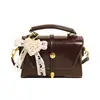 Bolsas Casuais Femininas 2026 Nova Bolsa Transversal Versátil Bolsa de Ombro Único para o Trabalho Bolsa de Mão Retrô de Primavera Bolsa Quadrada Pequena