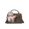 Bolso de mano de hebilla simple estilo nicho coreano Bolso Kelly con textura de color sólido elegante Bolso de hombro PU Bolso cruzado popular