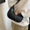 Bolso Cruzado Coreano de un Solo Hombro Otoño Bajo el Brazo Simple 2026 Viaje de Negocios Lujo Ligero Colgante Diagonal Moda Bolso de Mano Nuevo Súper Caliente Mujer Japonesa