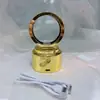 Lâmpada Giratória Base de Cristal com Gravação Interna 3D Luz Noturna Luminosa Caixa de Música LED Presente Criativo Venda por Atacado