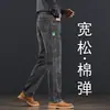 Jeans azules ligeros de alta gama italianos de verano para hombre, corte recto holgado, elásticos, adecuados para uso de negocios y casual.