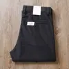 Estación europea verano pantalones gris oscuro hombre delgados mediana edad negocios sarga elástico cintura alta holgados rectos casuales