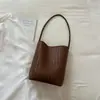 Elegante Xiaomi Moda Nicho Textura Tejida Bolso de Mano para Viajes Diarios Mujer 2026 Nuevo Bolso Cubo Retro Bolso de Hombro Bajo el Brazo