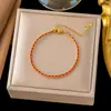 Pulsera de Hilo Rojo para Mujeres en su Año Zodiacal, Nueva Pulsera Estilo Chino con Diseño de Serpiente Dorada, Lujo Ligero, Nicho, Exquisita, Sensación de Alta Gama