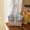 2026 Verano Nueva Moda Simple Gran Capacidad Rayas de Colores Tejida Estilo Vacaciones Bolso de Mano de un Solo Hombro