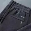 Liquidação Comércio exterior pedido original Manuseio de rejeitos Marca da moda Calças Esportivas Casuais Masculinas Retas Largas Calças de Moletom de Veludo