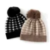 Cachemira 2026 Otoño e Invierno Nuevo para Mujer de Gama Alta Pied de Poule Bloque de Color Cálido Bola de Pelo Protección para Orejas Sombrero de Punto Casual