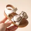 Sandálias de comércio exterior 2025 verão novas sandálias para meninas sandálias coreanas com laço para bebê sapatos de praia sapatos de princesa para crianças