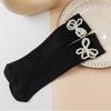 Calcetines apilados para niños, otoño e invierno, nuevos calcetines de tubo medio con perlas de un solo color, calcetines de princesa con lazo y perlas.