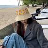 Sombrero de pescador de flores tejidas de celebridad de internet para mujer, estilo japonés, combina con todo, sombrero para el sol de verano, cubre la cara, pequeño sombrero de cubo con protección solar