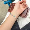 Pulsera de Perlas de Trébol de Cuatro Hojas Clásica Retro, Joyería de Agua Dulce Natural, Cadena de Extensión Multicolor, Estilo Ajustable y Versátil, Venta al por Mayor