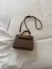 Bolso de hombro texturizado de alta calidad para mujer 2026 nuevo nicho moda bolso de mano simple bolso cruzado de gran capacidad