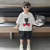 Traje de Verano con Dibujos Animados de Manga Corta para Niños 2026 Nuevo Estilo Shorts de Mezclilla Elegantes para Niños Conjunto Casual de Dos Piezas para Bebé Niño