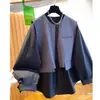 Colete de terno de alta qualidade estilo europeu com design de camisa de duas peças falsas, novo top longo de manga comprida solto e moderno para mulheres