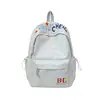 Mochila al por mayor estilo coreano estilo universitario versátil para ir al trabajo y a la escuela para mujer alta apariencia gran capacidad mochila casual escolar