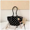 Nuevo bolso tote de gran capacidad, elegante y único, para principios de otoño de 2026, bolso de hombro de moda para el trabajo y los desplazamientos, bolso cubo de lunares