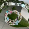 Pulsera Multitalismán Flor Roja Natural con Pegamento 6mm Doble Círculo para Mujer con Accesorios de Aguamarina Ojo de Tigre Dorado Pequeña y Fresca