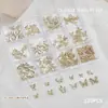 Accesorios para Uñas Artísticas Caja de 12 Compartimentos Mariposa Metálica Mixta Cuervo Corazón Cruz Cinta Lazo Decoración para Uñas de Forma Especial