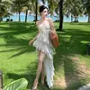Vestido Feminino de Verão Estilo Francês Floral Suave com Alças Longas Cauda Longa Plissada para Férias na Praia de Alto Padrão