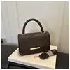 Moda de viajero estilo coreano cubierta texturizada única nueva 2026 color sólido casual simple bolso cruzado pequeño cuadrado