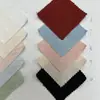 Venta al por mayor de tela nueva de gasa de algodón con patrón de espiga, con texturas geométricas transpirables, adecuada para ropa de mujer y niño