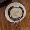 Pulseira DIY Mais Vendida Transfronteiriça Pulseira com Fivela de Couro Genuíno Artesanal Retrô Novo Pingente de Pena Unissex Mão