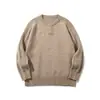 Yidao Vintage 2026 Otoño Nuevo Retro Sencillo Cuello Henley Hombre Color Sólido Holgado Suéter de Punto