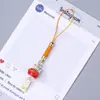 Colgante de llavero de cuentas de rompecabezas, colgante de gato de la suerte de cerámica pintada, llavero con etiqueta de mensaje de bendición, cadena para teléfono, pequeño adorno