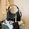 Bolso Casual y Elegante para Mujer Verano 2025 Nuevo Bolso de Axila de Gama Alta Diseño de Nicho Bolso de Hombro Cruzado Único