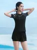 Nuevo traje de baño de mujer estilo tankini 2026, adelgazante y que esconde la barriga, de manga corta, adecuado para aguas termales, playa y vacaciones en resorts, conjunto de dos piezas