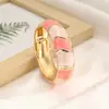 Bestseller transfronteiriço na Europa e América: Pulseira de design irregular em blocos de cores esmaltadas retrô criativas com design de bambu ondulado boêmio