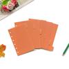 Página separadora de cuaderno A7 con núcleo de repuesto de hojas sueltas de color naranja con borde cruzado, página de índice de 6 páginas con título incorrecto.