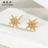 Pendientes de acero de titanio con corona tachonada de diamantes de alta gama de moda transfronteriza europea y americana, pendientes elegantes y exquisitos de temperamento, venta al por mayor de Yiwu