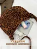 Bolsa Feminina Vintage em Formato de Chifre 2026 Novo Estilo Coreano Bolsa Tote de Camurça Bolsa de Ombro Transversal Casual de Grande Capacidade