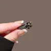 Pinza para el Cabello Pequeña de Estrella con Pedrería para Mujer Clip para Mechones de la Frente Flequillo Pinza Elegante Temperamento Estilo Lujo Ligero Nuevo 2026 Pinza para el Cabello Lateral