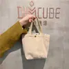 [En stock] 910262 bolsa artística de pana portátil casual pequeña para mujer bolsa de tela vintage bolsa de almuerzo