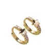 Pendientes y Clips de Oreja Exquisitos de Estrella de Venta Caliente Transfronterizos para Mujer, Aros y Clips de Oreja Personalizados de Estrella de Cinco Puntas de Nicho, Accesorios de Oreja de Moda para Mujer
