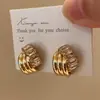 Estilo Igual del Bloguero Coreano Fever's, Pendientes Exquisitos Geométricos de Zirconia Dorada con Micro-Brillo, Pendientes Modelo Nuevo 2026