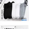 Venta al por mayor de fábrica calcetines de barco calcetines para hombre calcetines para niños de boca baja invisibles color liso negro blanco gris calcetines deportivos primavera verano otoño