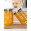 Alimento Enlatado Amarillo de Durazno Redondo Resistente a Altas Temperaturas Cocido al Vapor Botella de Vidrio Vacía Tarro Transparente Sellado para Empaquetar Mermelada de Res con Chile