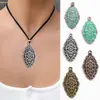 Europa y Estados Unidos más vendidos joyería retro de aleación colgante etiqueta de patrón irregular accesorios para colgante de collar DIY