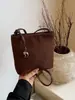 Bolsa de veludo fosco 2026 novo modelo saco de balde, bolsa de ombro vintage de alta qualidade, bolsa pequena transversal versátil da moda para o dia a dia