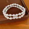 Pulsera de doble hilo estilo vintage francés con estrella de circonita cúbica y perlas, una pieza de joyería lujosa y elegante, un accesorio delicado y versátil para mujeres