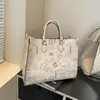 Bolsa Feminina 2025 Nova Chegada Fashion Simples Grande Capacidade Carta Flor Antiga Bolsa Tote Portátil para o Dia a Dia Bolsa Feminina