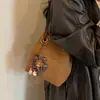 Nova coleção Outono 2026: bolsa de axila feminina, um design retrô estiloso e único com uma estética sofisticada, perfeita para o trajeto diário